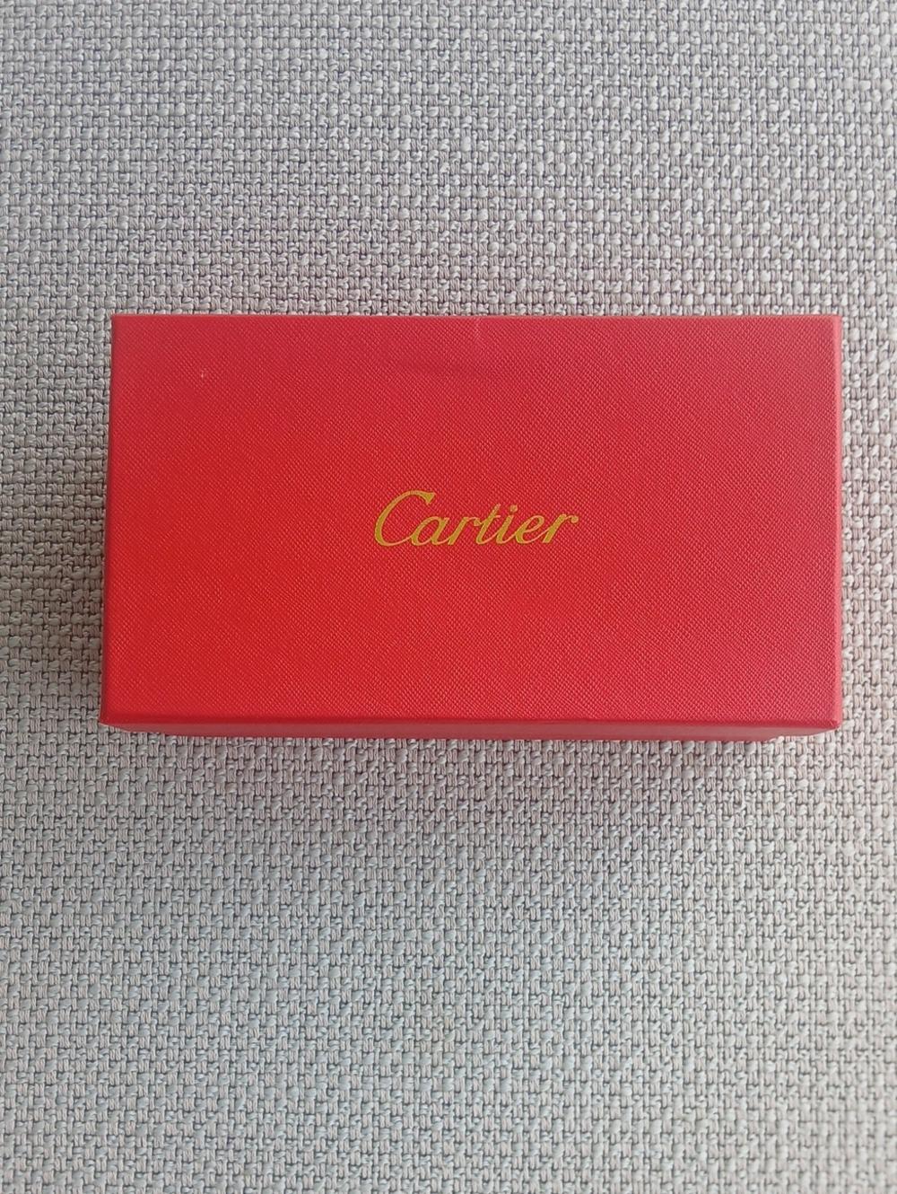 Cartier red box with gold logo